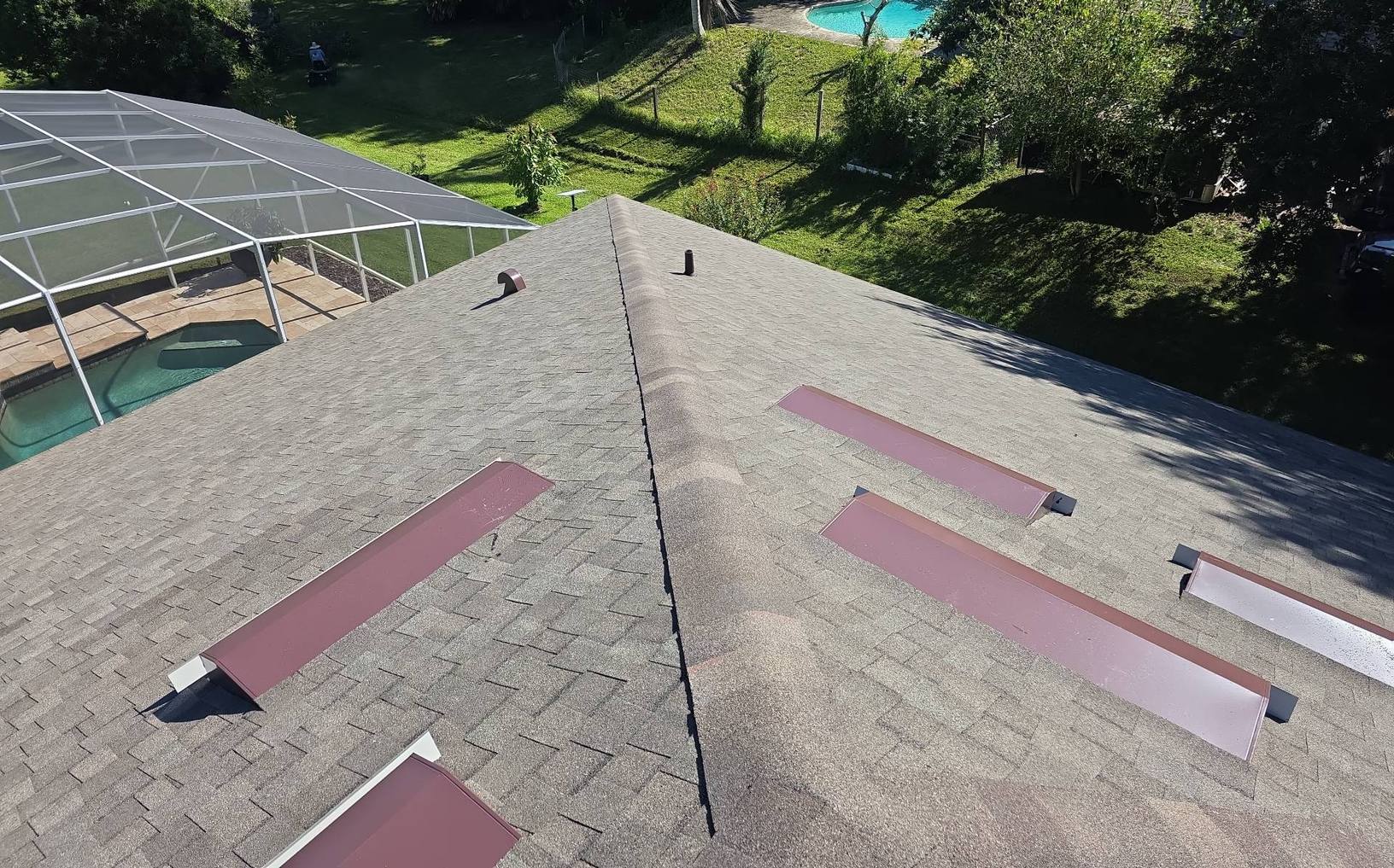 Ridge of the finished Titan XT shingle roof in Deltona FL